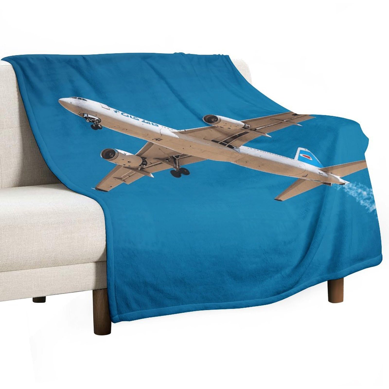Couverture avion bleue quatre saisons pour cocooning au salon