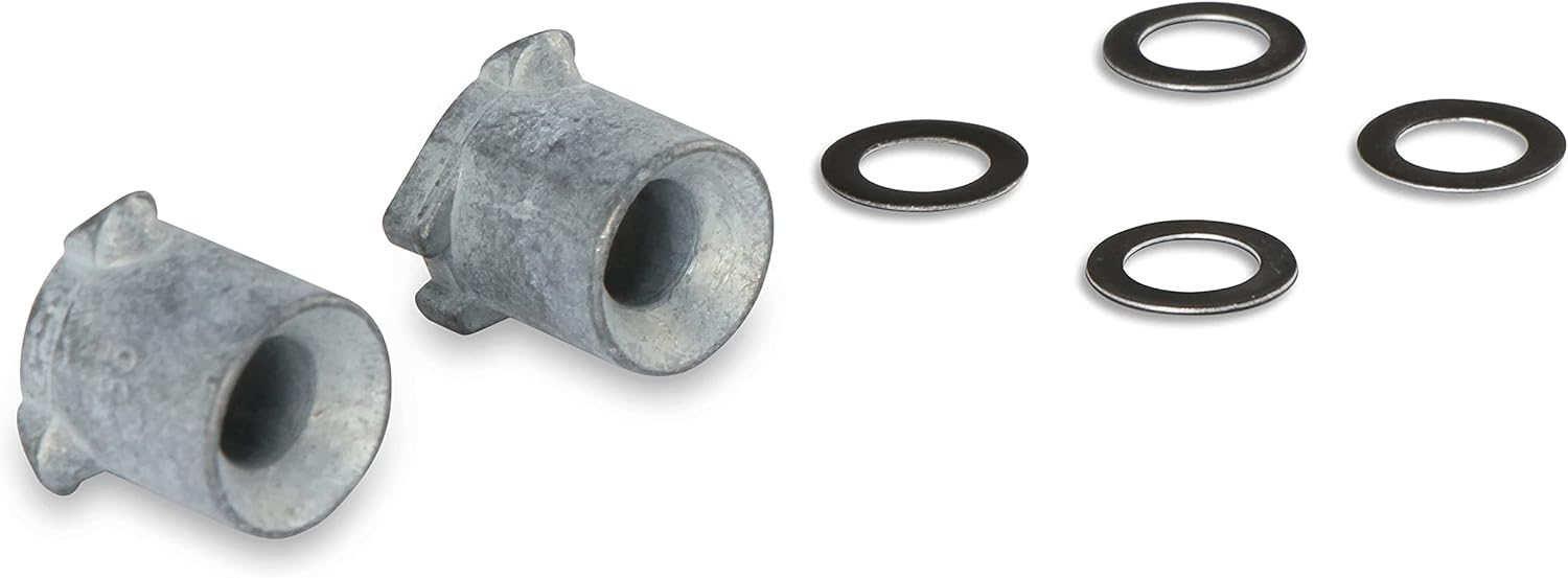 Angolat view of two Holley 121-125 accelerator pump discharge nozzles and four black washers