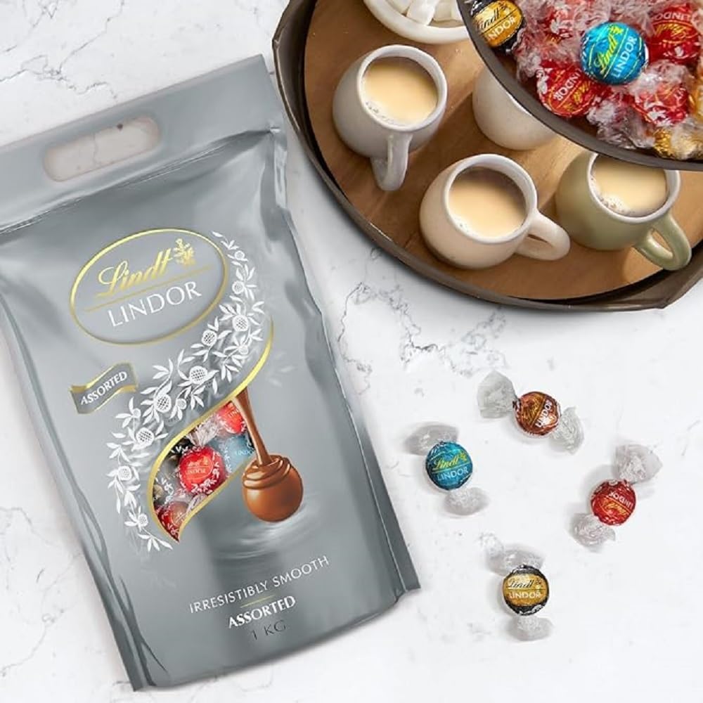Lindt LINDOR bombones – 1kg, chocolate con leche, chocolate negro 70%, doble chocolate, caramelo sal, relleno de chocolate cremoso, surtido de chocolate — view 5