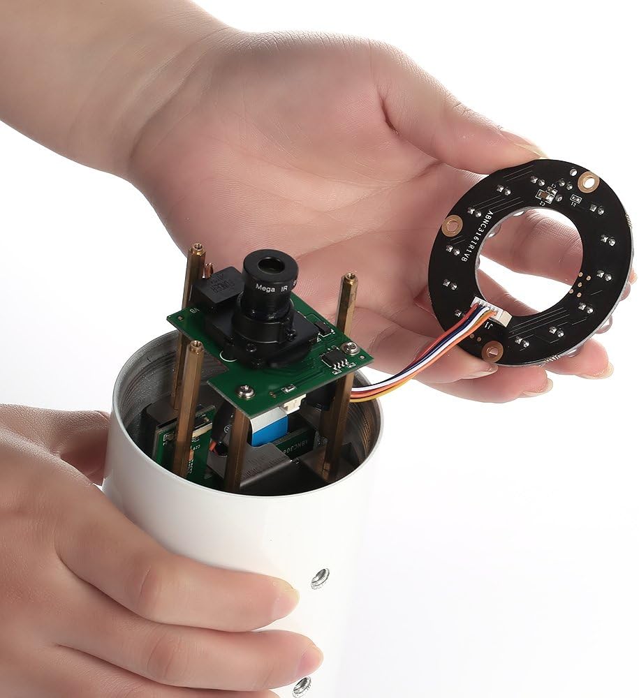 Hands holding camera body and IR LED board