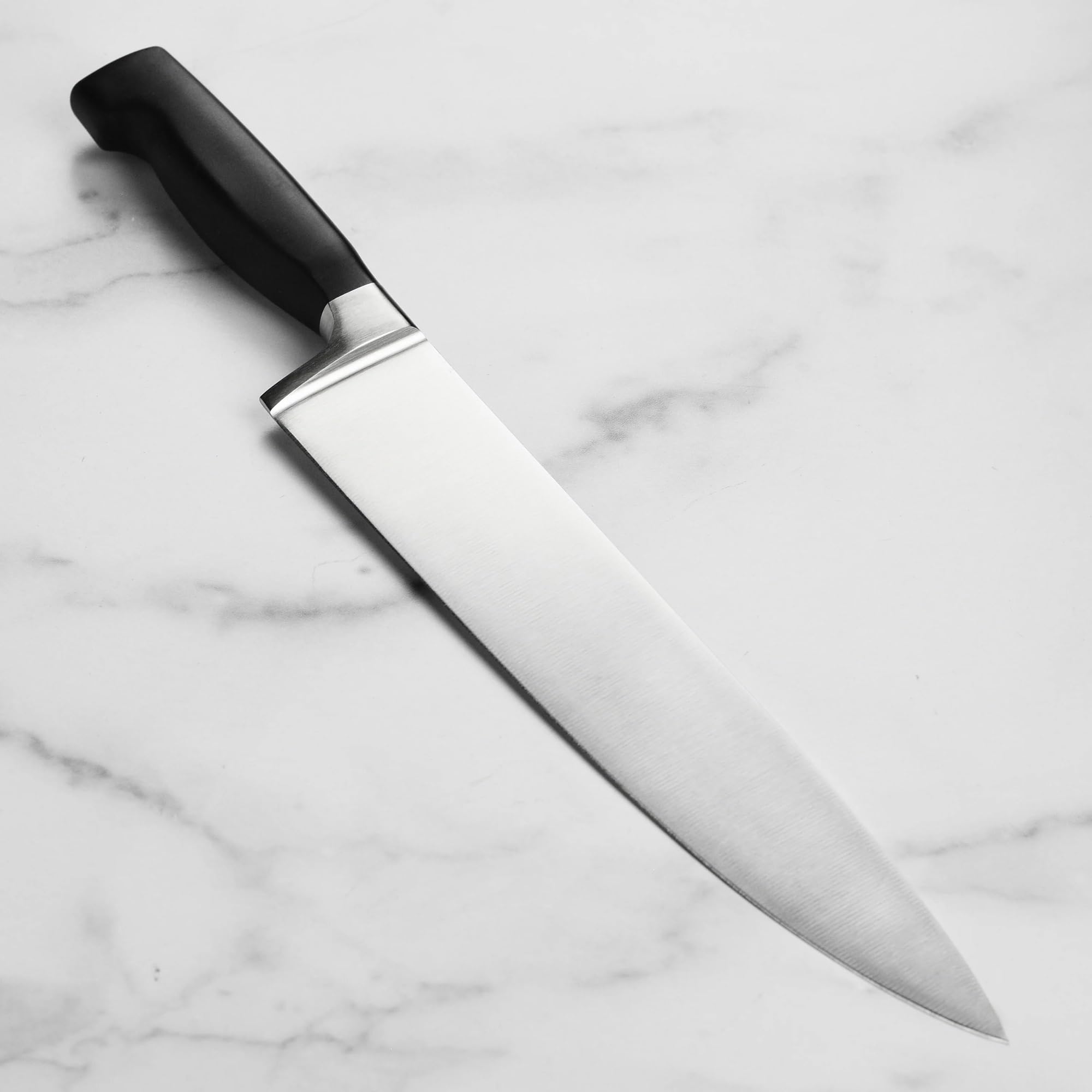 ZWILLING Four Star 10-inch Razor-Sharp German Chef's Knife, Made in Company-Owned German Factory with Special Formula Steel perfected for almost 300 Years, Dishwasher Safe — Amazon image 3