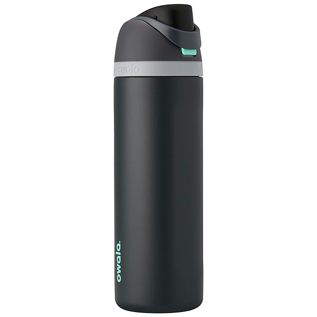 Owala FreeSip Insulated Stainless Steel Water Bottle 24 oz in foggy tide aqua finish on a wooden gym bench, the dual-action FreeSip lid showing both the built-in straw and the chug spout, the TikTok-favorite hydration pick with 121,137 buyer ratings