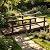 WISLAS 7FT Wooden Garden Bridge with Handrails, Decorative Landscape Footbridge for Yard, Pond, Farm or Creek - Rust-Resistant Cedar Construction, Easy Assembly & 400LB Capacity