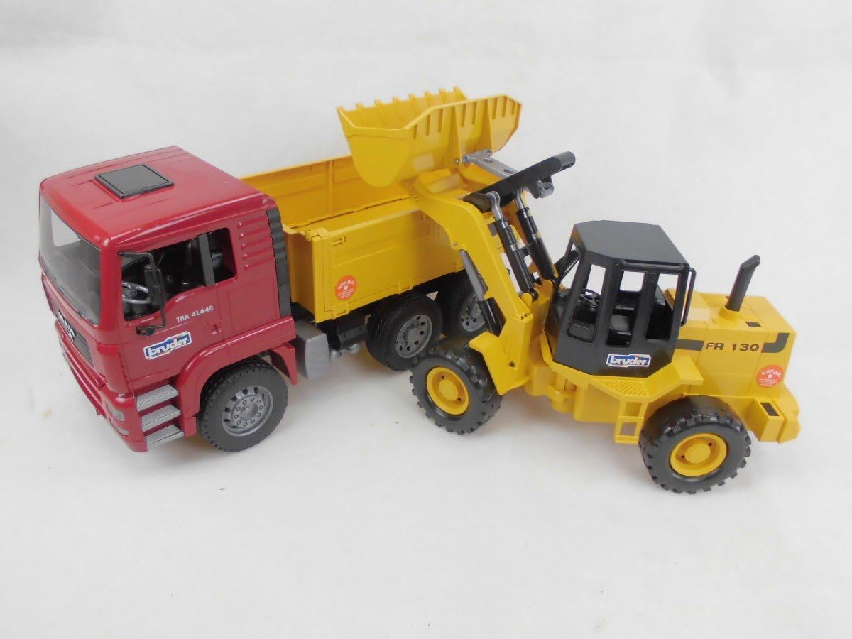bruder FR130 Articulated Wheel Loader with raised shovel arm loading the dump truck