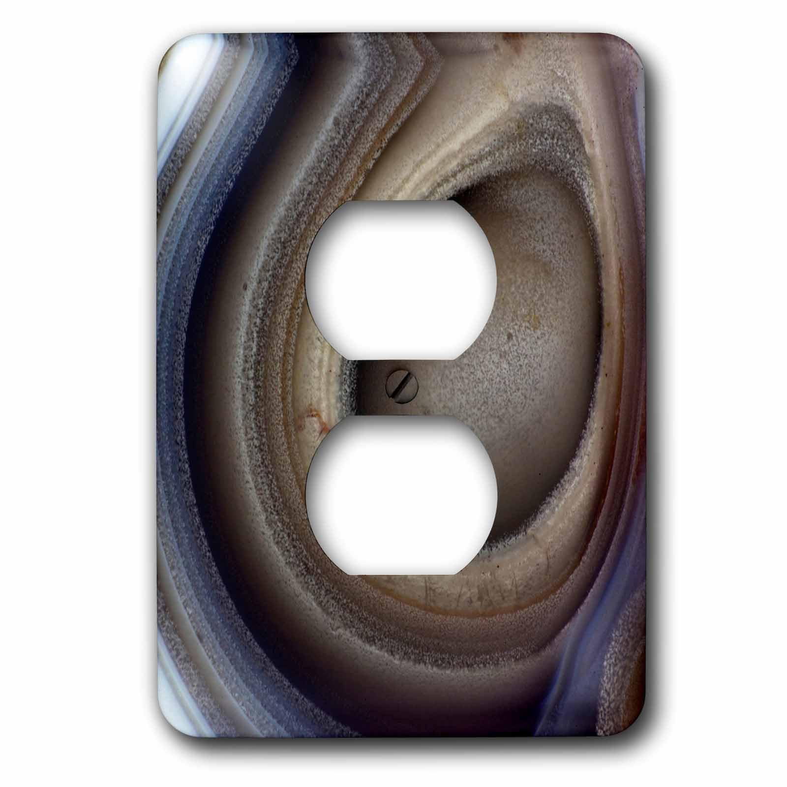 Prise de courant décorative gris agate pour harmoniser l'ambiance de votre salon
