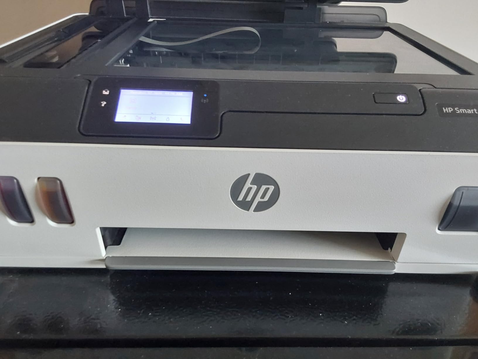 HP Smart Tank printer front view with ink tank windows visible