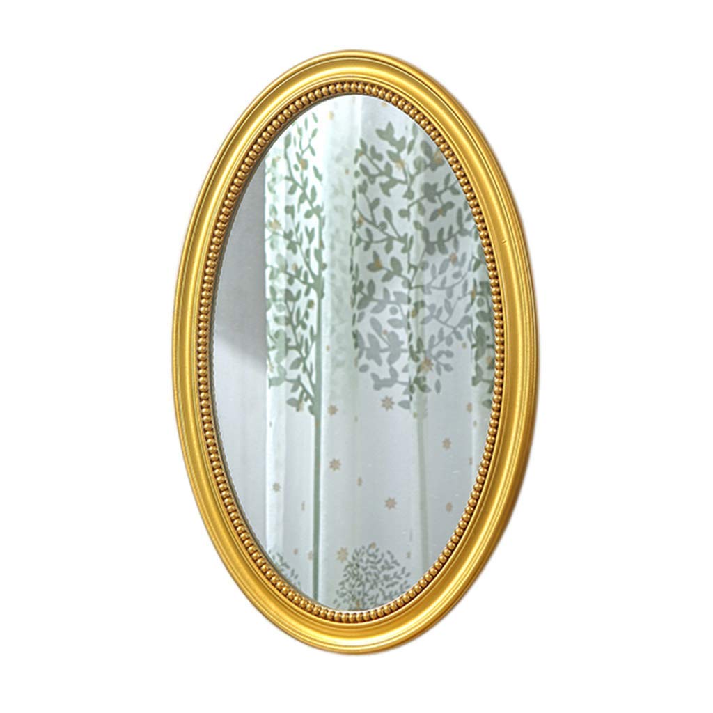 Miroir de maquillage d'une chambre antique moulure dorée chic