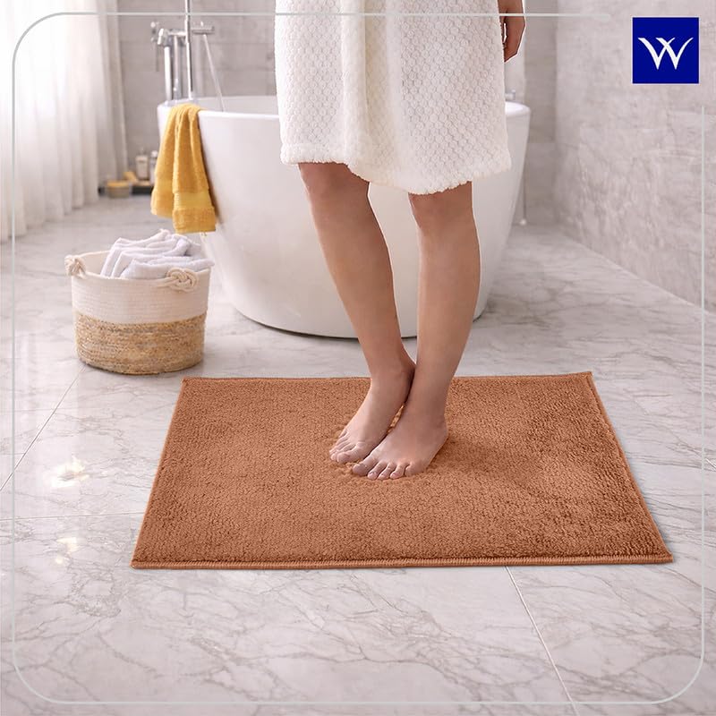 Image of Welspun Premium Bath Mats Small for Hall, Bedroom & Living Room | Solid Design | Anti Skid | Easy Care | Good Absorbent | Machine Tufted | (2 x 2 ft, Dark Brown)