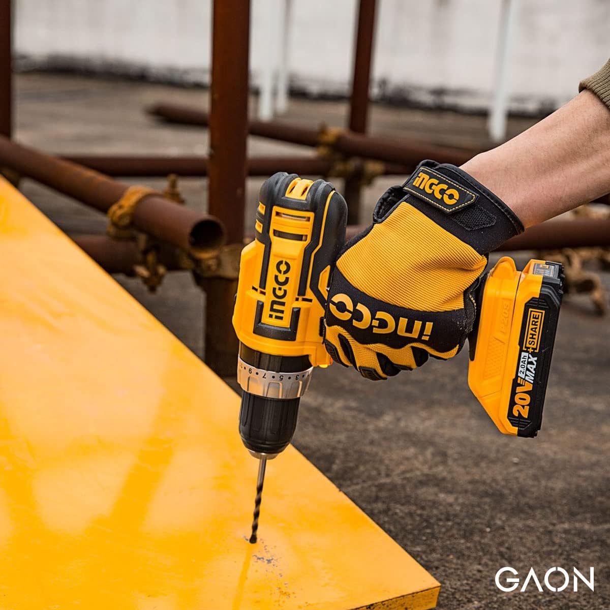 User holding the INGCO drill, demonstrating ergonomic grip