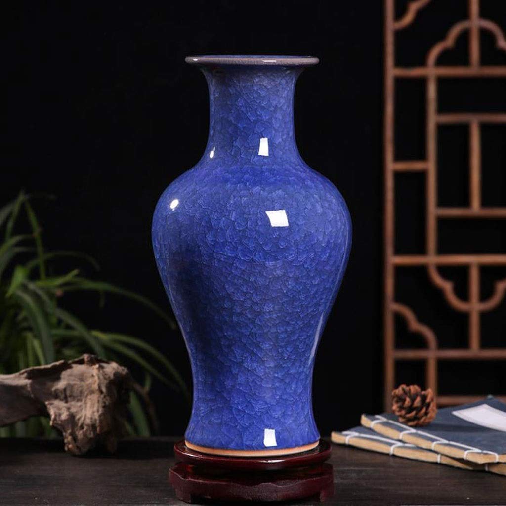 Vase en céramique monochrome aux couleurs accidentées individuelles pour fleurs séchées