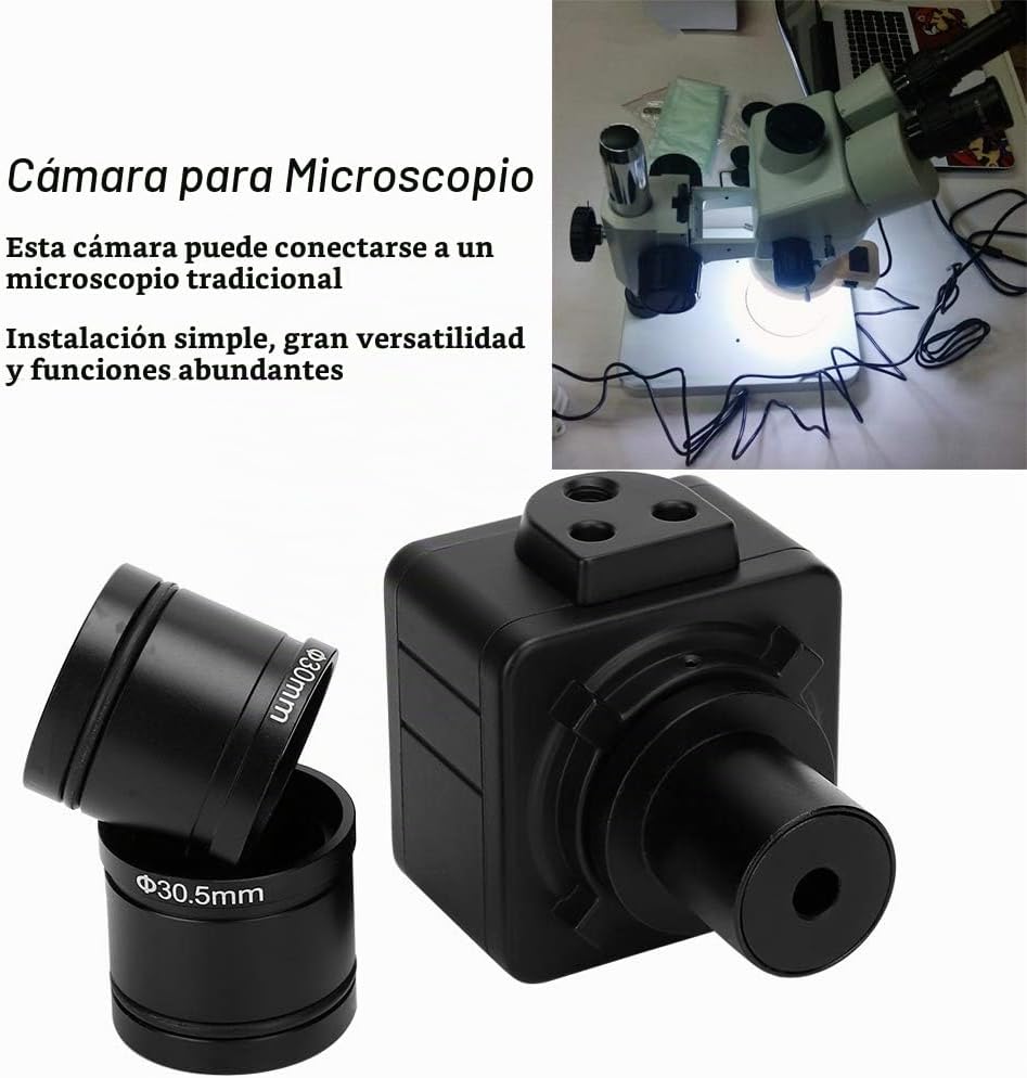 Microscope camera with various adapters and a microscope in the background
