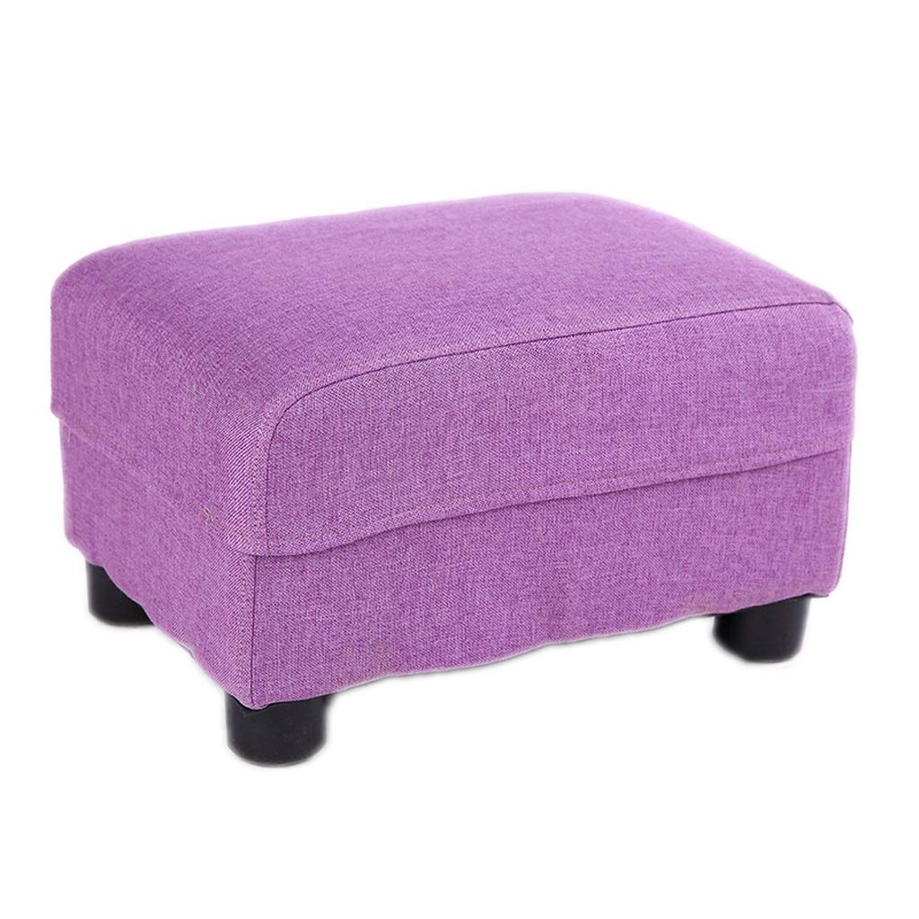 Fauteuil rembourré et son tabouret repose-pieds pour soulager vos jambes