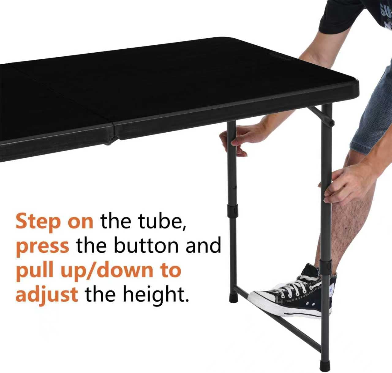 Person pressing the button on a table leg to initiate folding.