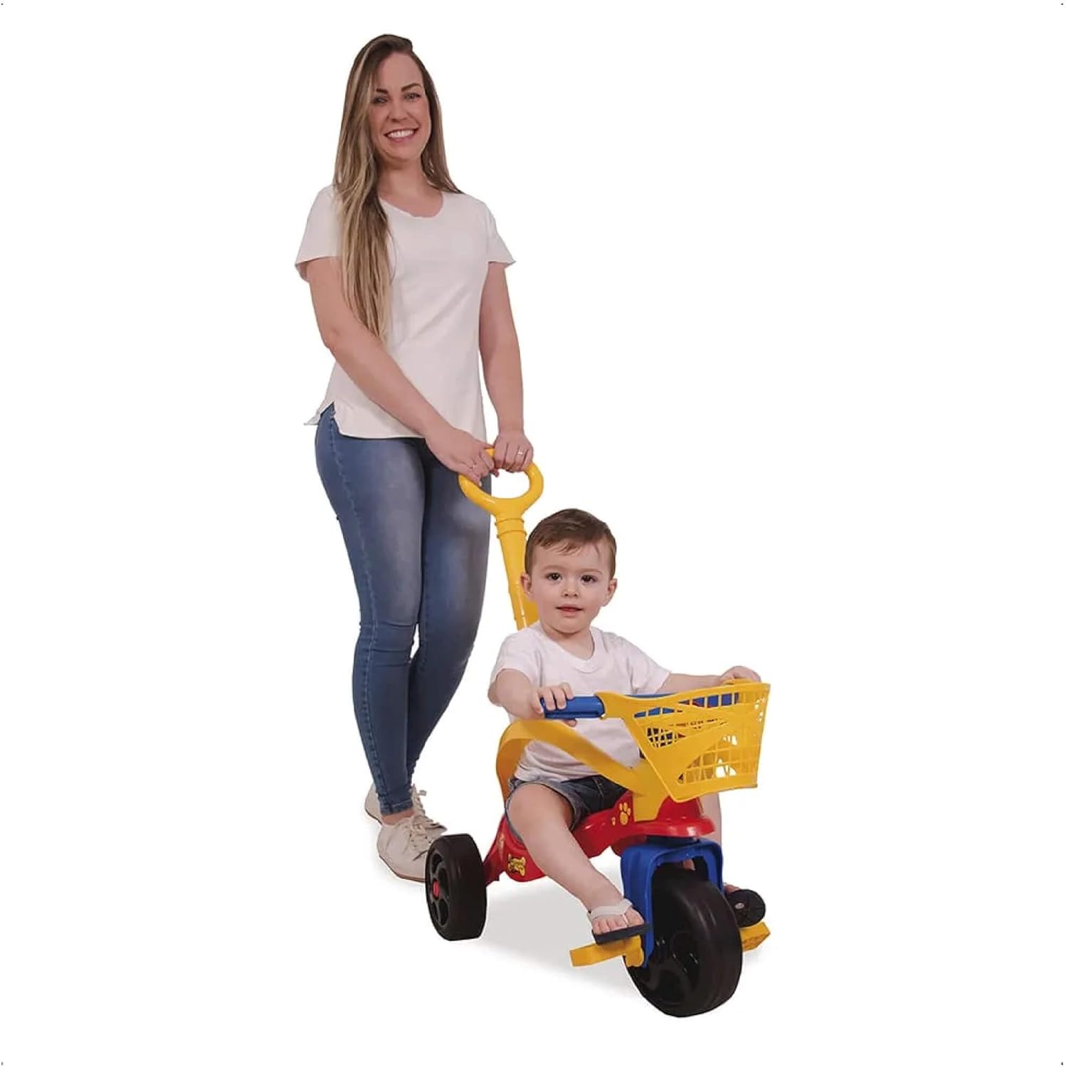 Adult pushing a child on the Xalingo Doggy Tricycle