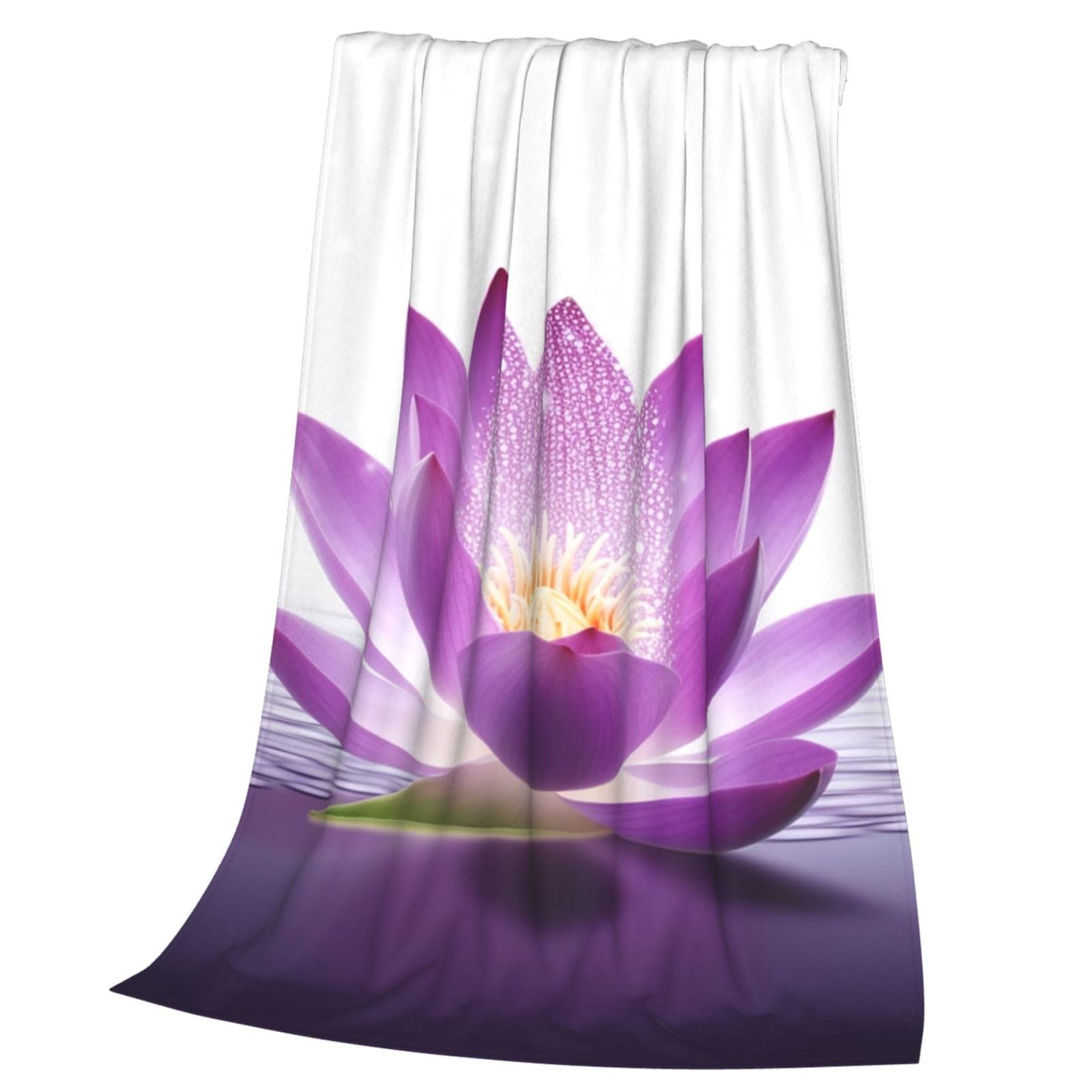 Couverture flanelle lotus pour des soirées cocooning sur le canapé