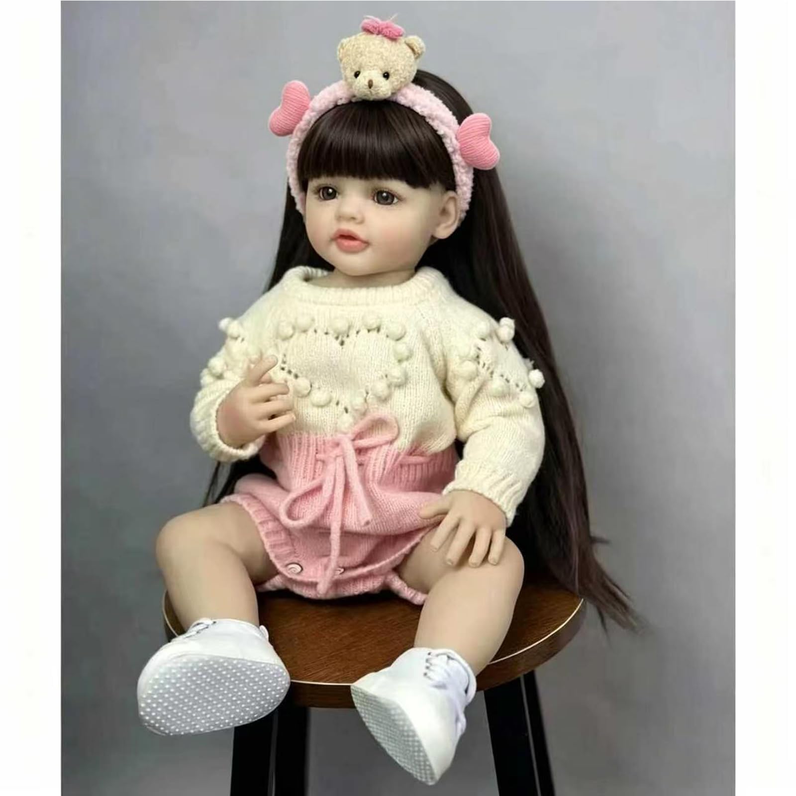 Reborn Lalka 55 cm Realistyczne Dziecko Miękki Silikonowy Winyl, Noworodek Dziewczyna Z Ruchomymi Stawami, Długie Brązowe Włosy, Różowy Strój Z Akcesoriami