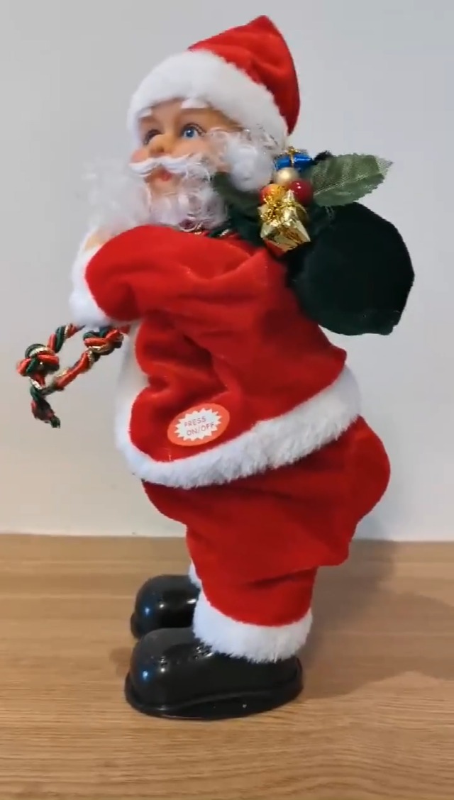 Amazon.com: Electric Santa Claus Shaking Hips Head Singing Thumb