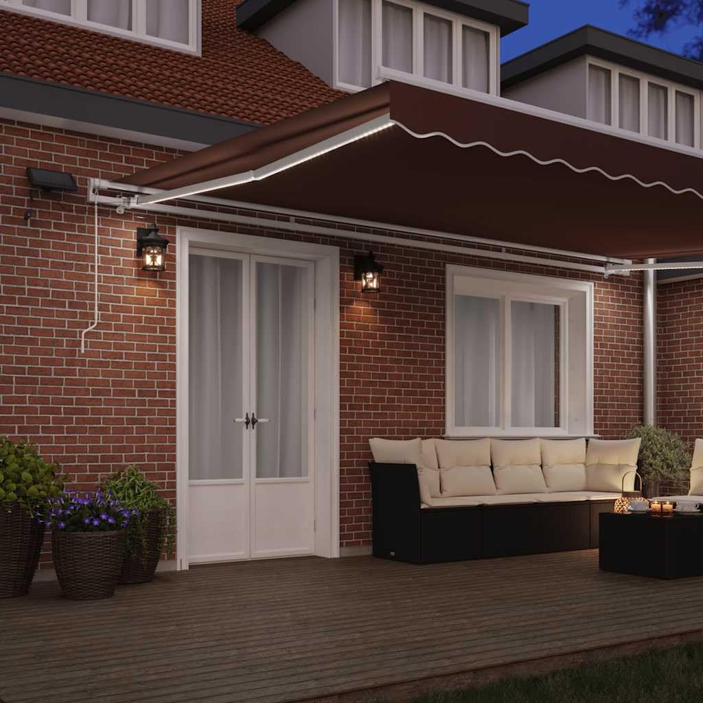Manuelle Markise mit LED-Beleuchtung in Braun 500x300 cm, UV-beständiger Sonnenschutz für Terrasse und Balkon Dieser manuell bedienbare Kurbelmarkise in den Maßen 500x300 cm