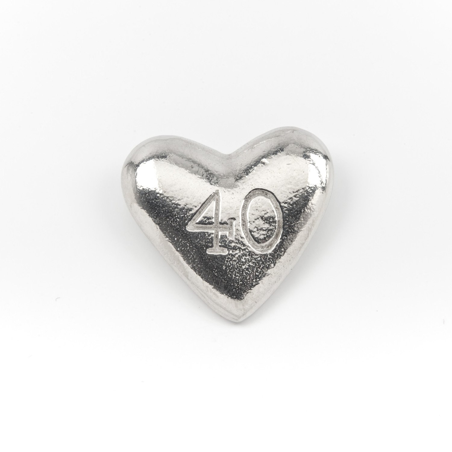 Metal Planet Ltd 40 - A pewter mini heart shaped pocket token