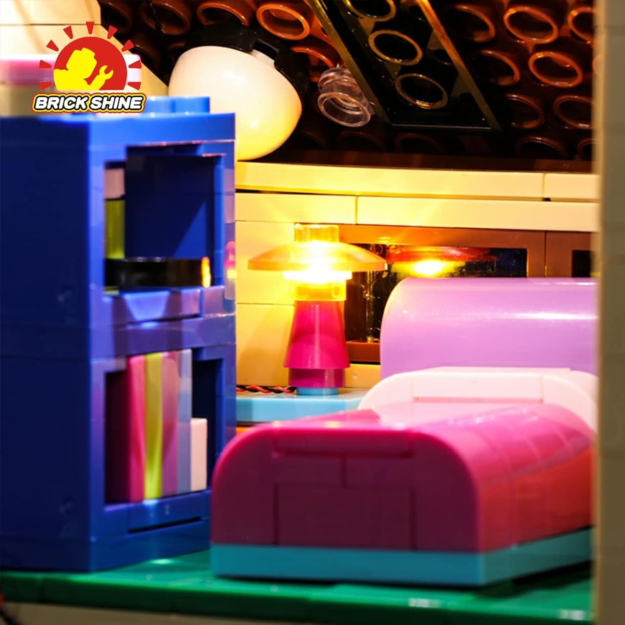 Close-up of an interior room of The Simpsons House model with a small lamp and other furniture illuminated by the light kit.