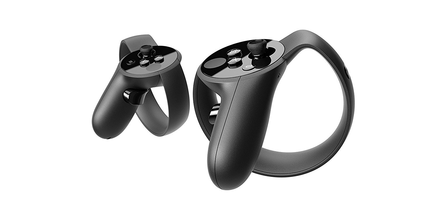 Close-up of an Oculus Touch controller with the battery compartment open, showing an AA battery being inserted.