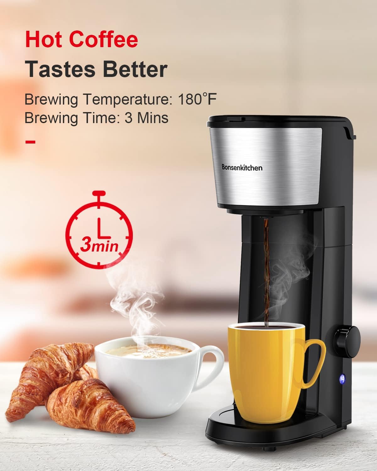 Coffee brewing into a yellow mug with croissants