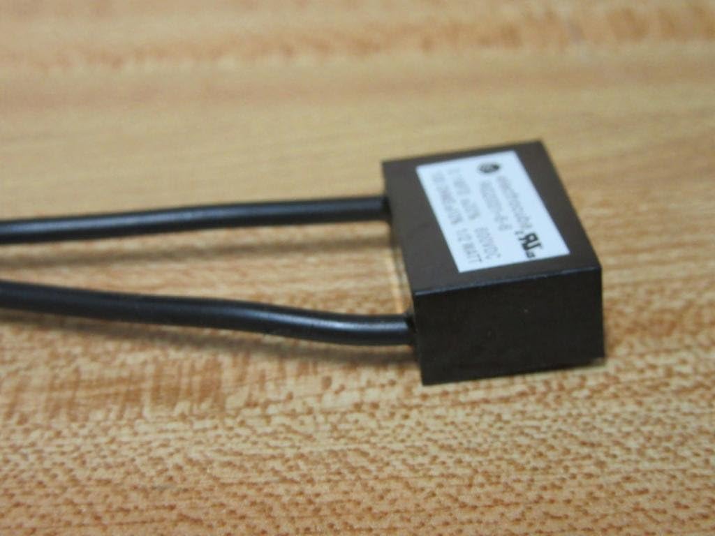 Side view of the YORK 031-00808-000 Surge Suppressor