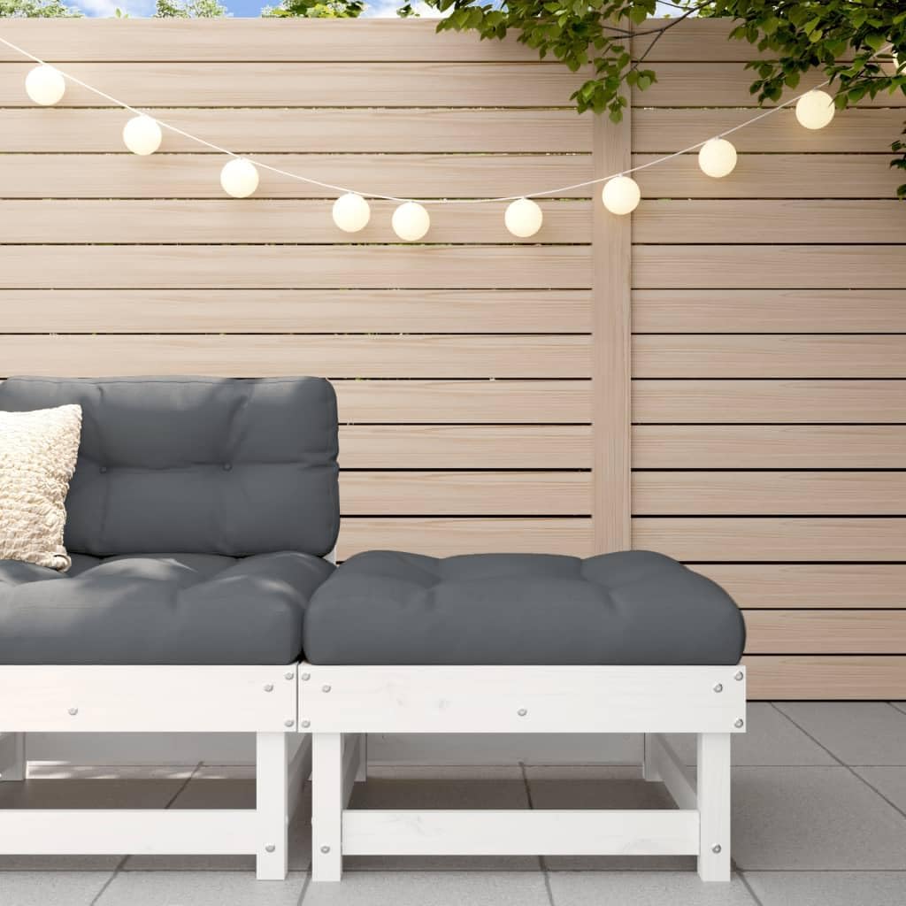 Assembled vidaXL modular patio middle sofa with cushions, placed outdoors on a patio with string lights.