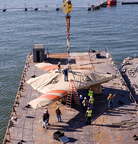 Contractors hoist the X-47B Unmanned Combat Air System Poster Print by Stocktrek Images (24 x 24)