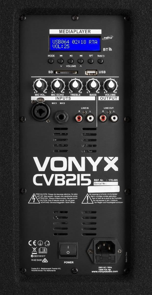 Close-up of the Vonyx CVB215 rear panel, detailing the media player controls, USB/SD card slots, microphone inputs, line inputs, and output connections.