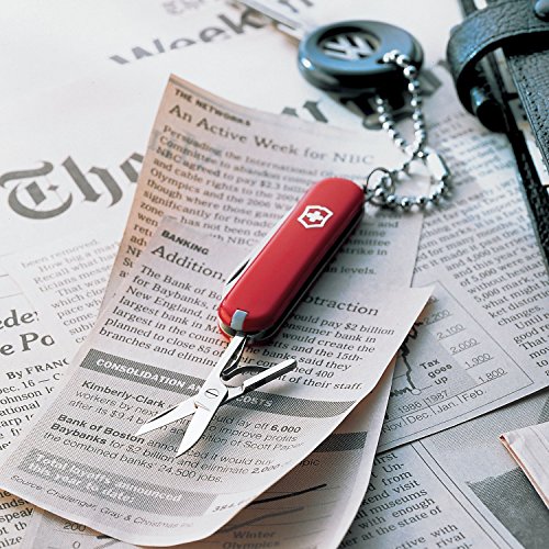 Image of Victorinox Classic SD Swiss Army Knife, Compact, 7 Functions, Swiss Made Pocket Knife with Small Blade, Screwdriver and Key Ring - Style Icon (Red)