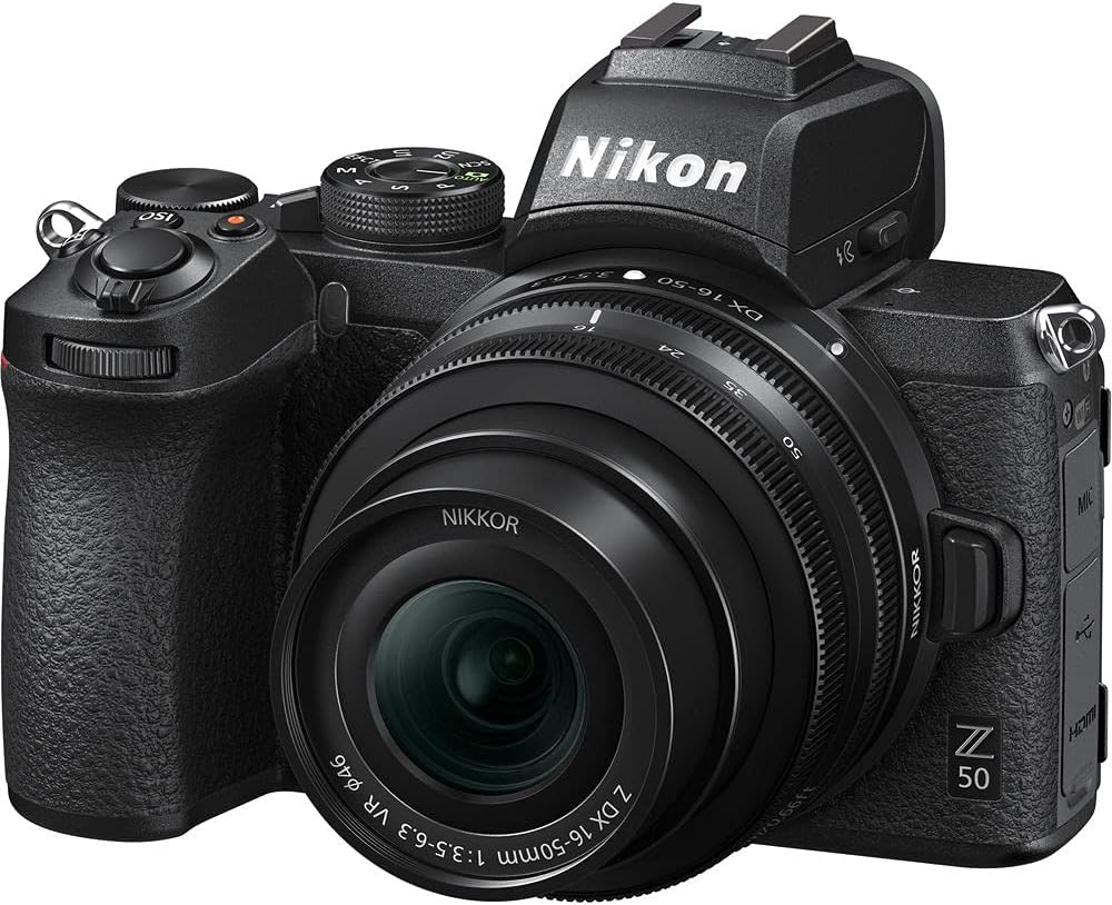 Nikon Z50 Mirrorless Digital Camera with 16-50mm Lens (1633) + Camera Bag + 46mm UV Filter + SanDisk 64GB Extreme PRO Memory Card + Hand Strap + Portable LED Video Light + More