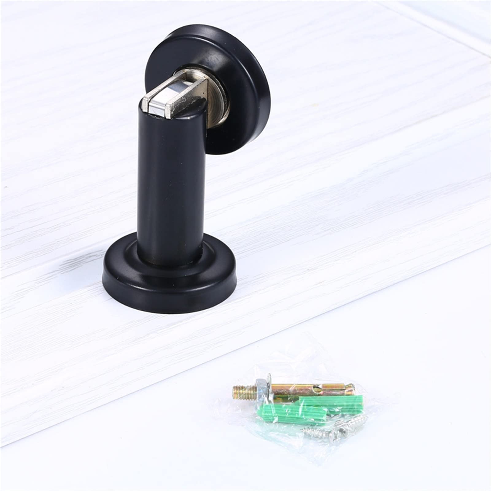 Butée de porte à forte aspiration magnétique pour double usage au sol