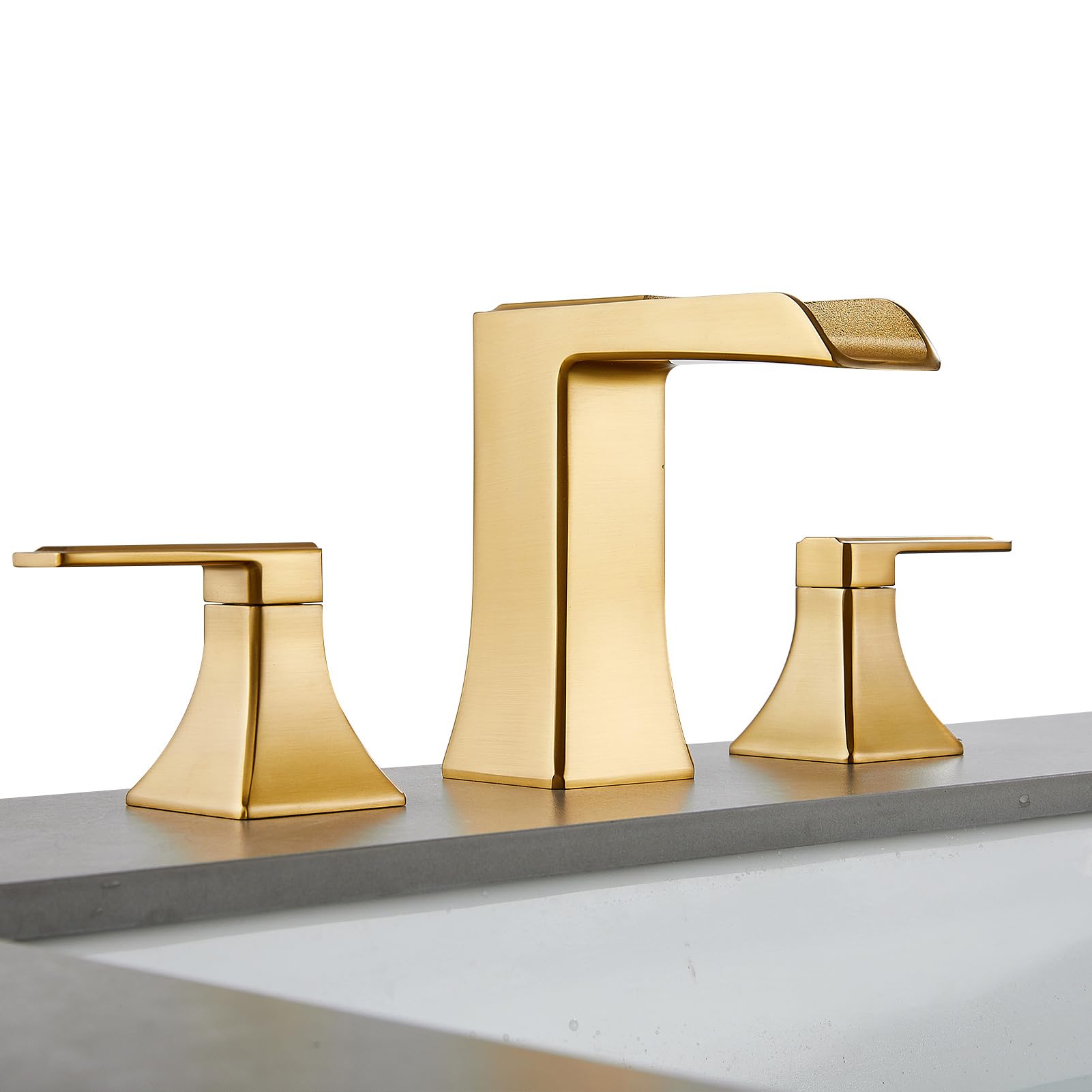 SANLIV Brushed Gold Waterfall Bathroom Faucet installed in a sink