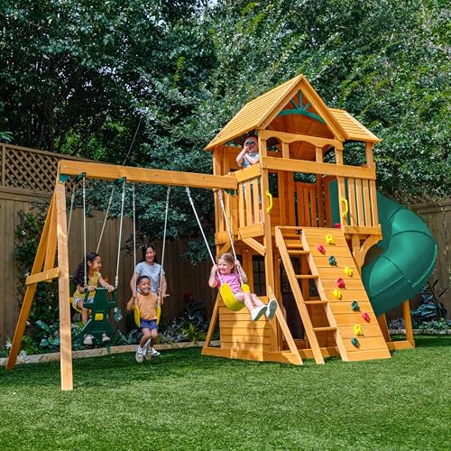 Image of KidKraft Buffalo Crossing Wooden Outdoor Swing Set with Tube Slide | Two-Story Playhouse, Rock Wall, Glider, Faux Stone Facade, Planter Boxes