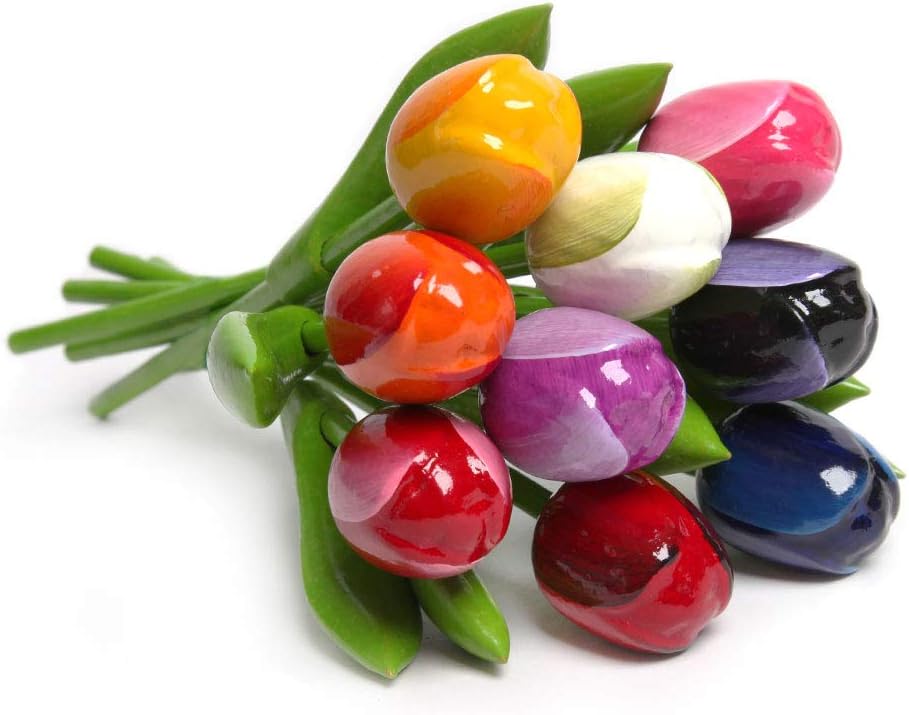 Bouquet di tulipani gialli e iride fiori su un tavolo di legno, raggi