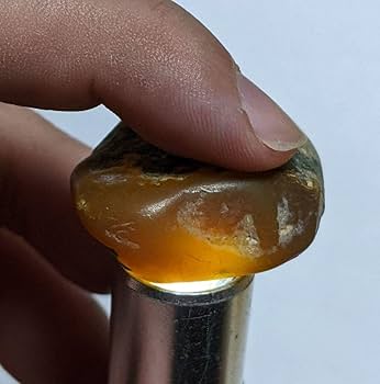 クリスタルページです。天然石 津軽錦石 の 勾玉(まがたま)です。 天然石 津軽錦石 の 獣型勾玉(まがたま)です。青虎目石 ブルー