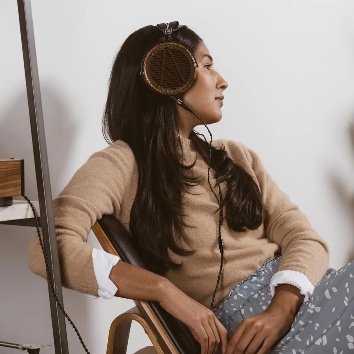 Person wearing Audeze LCD-3 headphones