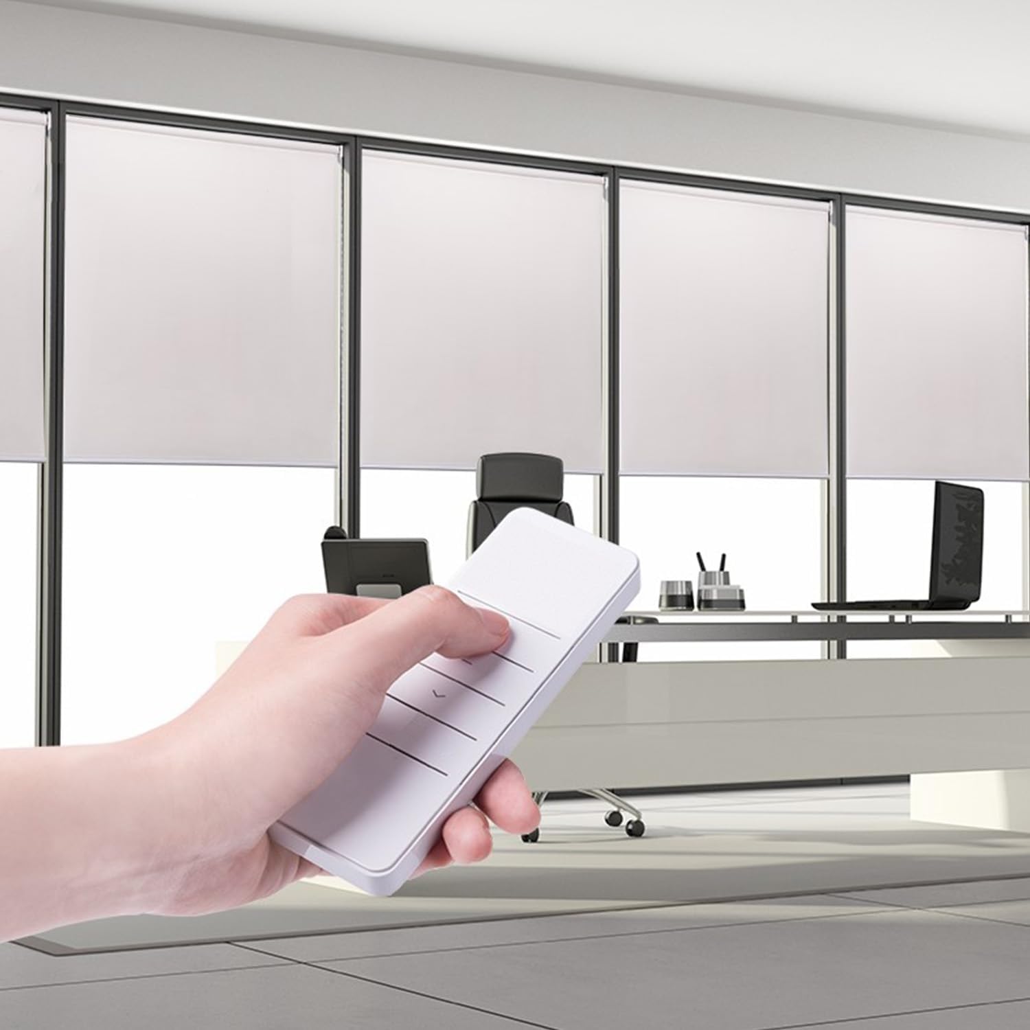 Hand operating a roller blind with a remote control