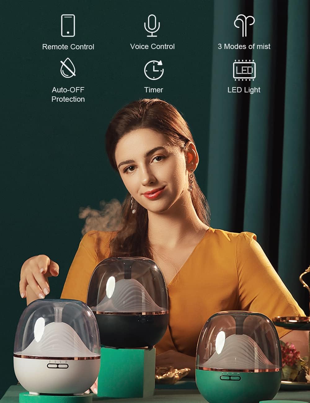 Woman sitting with three Ankrs diffusers, icons for remote control, voice control, auto-off, timer, 3 mist modes, and LED light are displayed