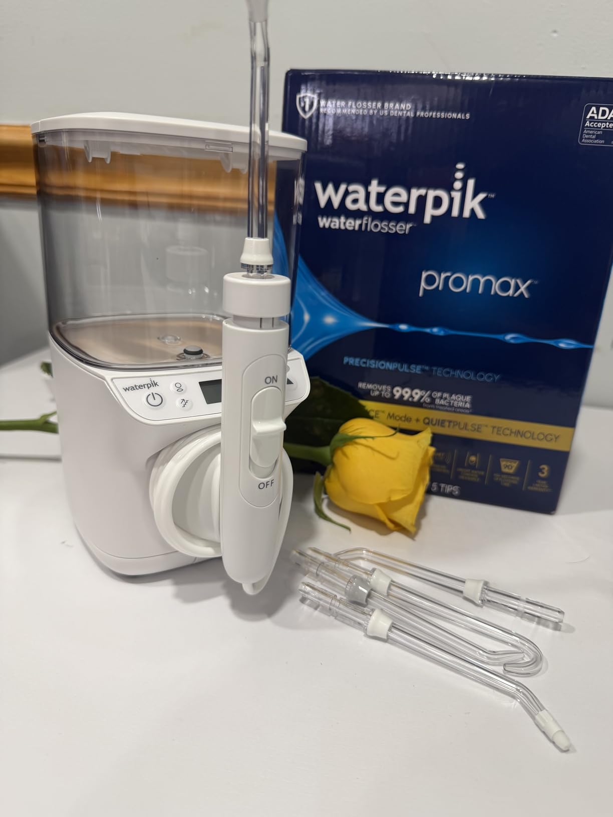 Waterpik Promax Water Flosser with SmartAdvance Mode for Daily Gum Health and Cleaning Teeth, Braces, Implants, ADA Accepted, Small Quiet Design, Electric Flosser with 10 Settings, 5 Tips, WF-23