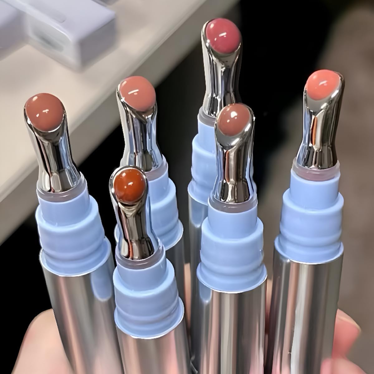 Cappuvini Mirror Water Shine Essence Lip Gloss | Moist and Submissive Light Texture | Moisturizing Lip Tint with Cooling Ice Roller Applicator | Lip Protection Formula | Long-Lasting Liquid Lipstick | Ice-Themed Shades Light Pink Light Nude Color With High glossy Shine (06# Pomegranate Ice, 2.5g)