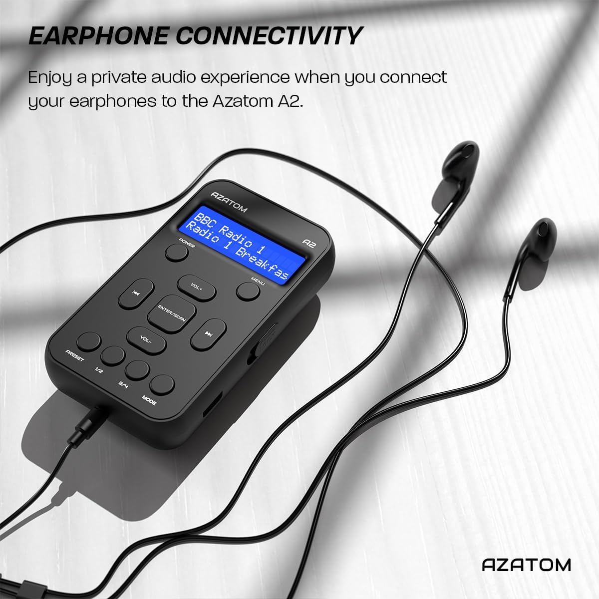 AZATOM A2 radio with earphones plugged in, showing earphone connectivity.