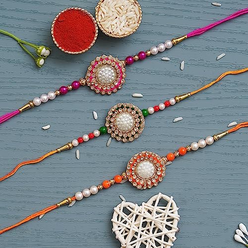 Image of eCraftIndia Set of 3 Rakhi Combo Hamper | Om Krishna Peacock Feather Lord Ganesha Silver Religious Designer Rakhis | Roli Chawal Pack