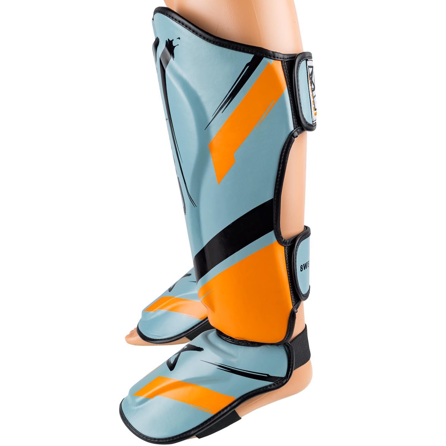 8 WEAPONS Espinilleras Shift, color gris hielo naranja, entrenamiento y competición, piel sintética de alta calidad y amortiguación perfecta, Muay Thai, K1, MMA, karate y kickboxing