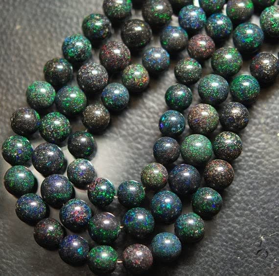Opale noire matrix d'Australie en rondelles de prestige, gemme rare 191 carats pour bijou luxe