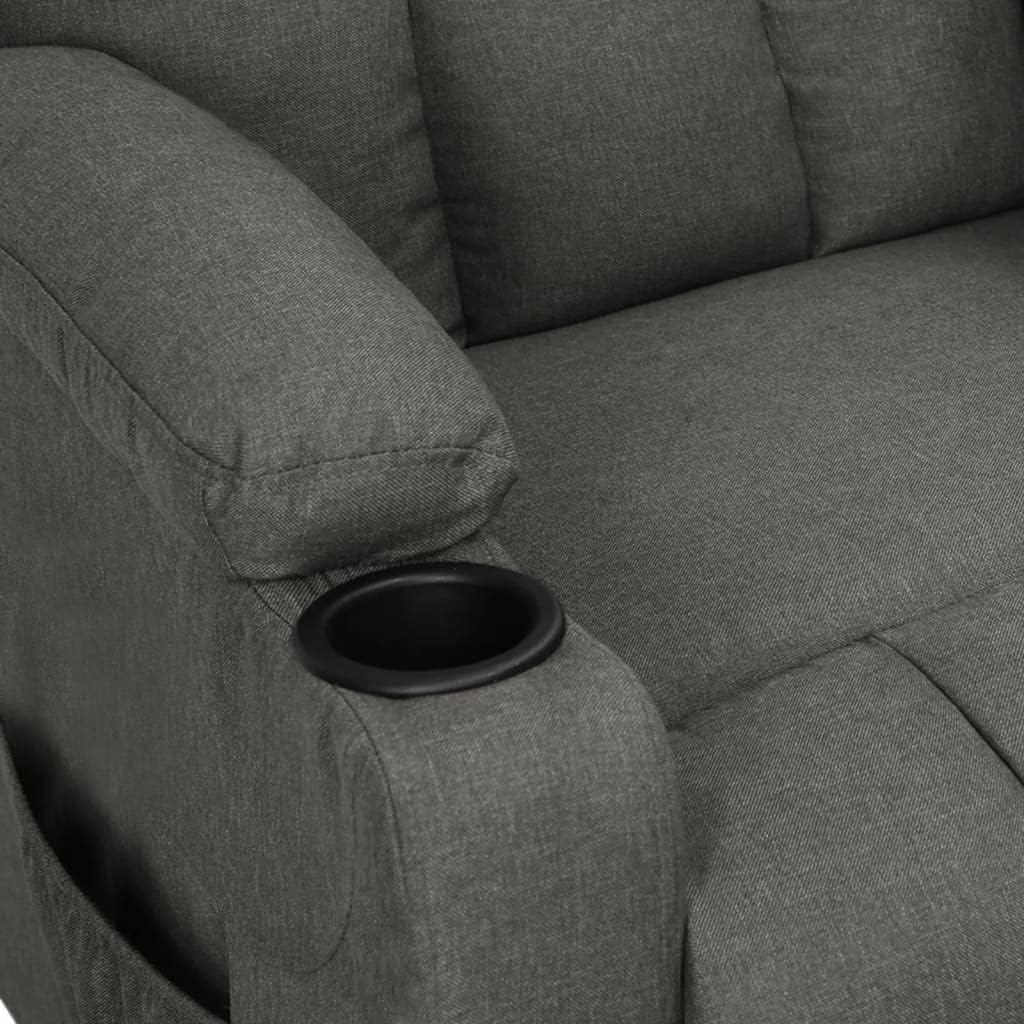 Close-up of integrated cup holder on recliner armrest