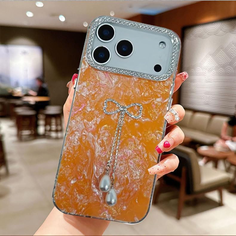 Image of mobistyle Compatible with iPhone 17 Pro Max | Shell Pattern with Bow Tassel and Daimond Camera Lens Protection Back Cover Case for Women Girls iPhone 17 Pro Max (Orange)