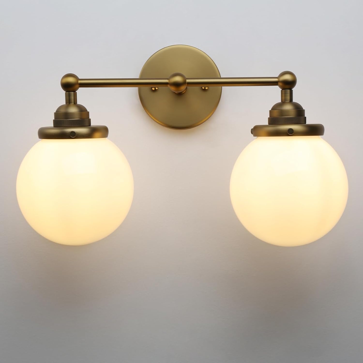 Yosoan Indoor 2 Light Milk Glass Antique Brass Wall Sconce, Vintage Industrial Modern Farmhouse Hardwired, Double 5.9" White Round Globe Shade Sconce for Living Room Sink Bedroom Vanity(Antique)