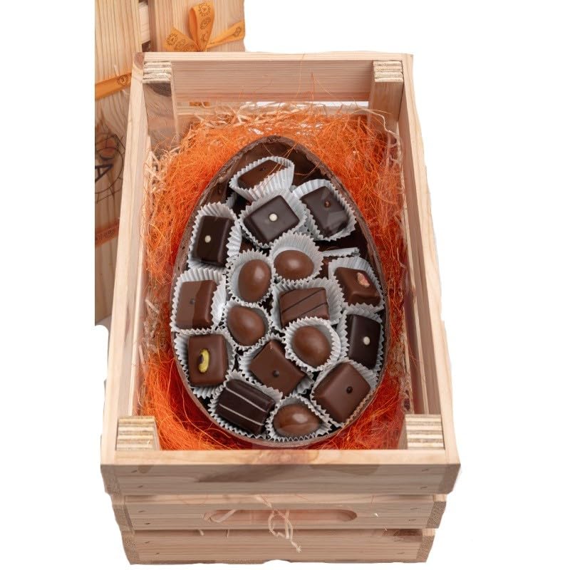 Coquille de chocolat croustillante avec pralines, coupes et œufs dans un coffret en bois (700 g)
